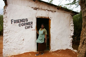 Ruphence outside her little café