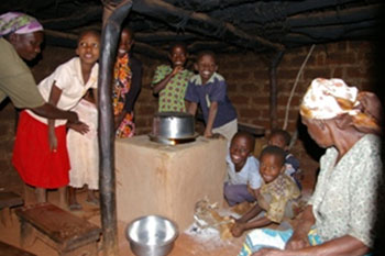 Mamma Mzee and some of her grand children around their new stove